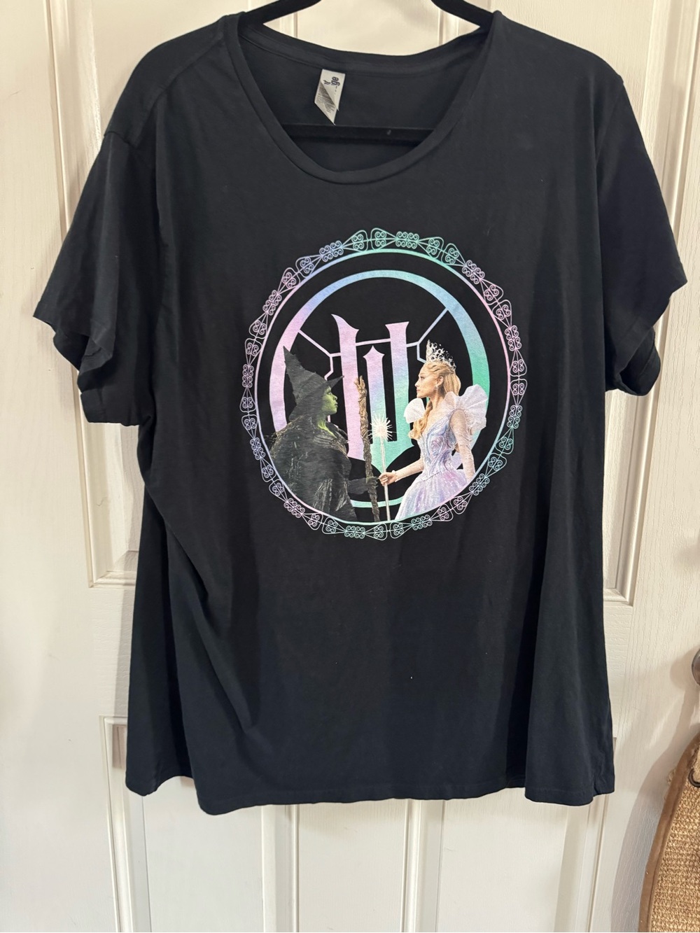 Black Graphic Women’s Tee with Pastel Circle Motif
